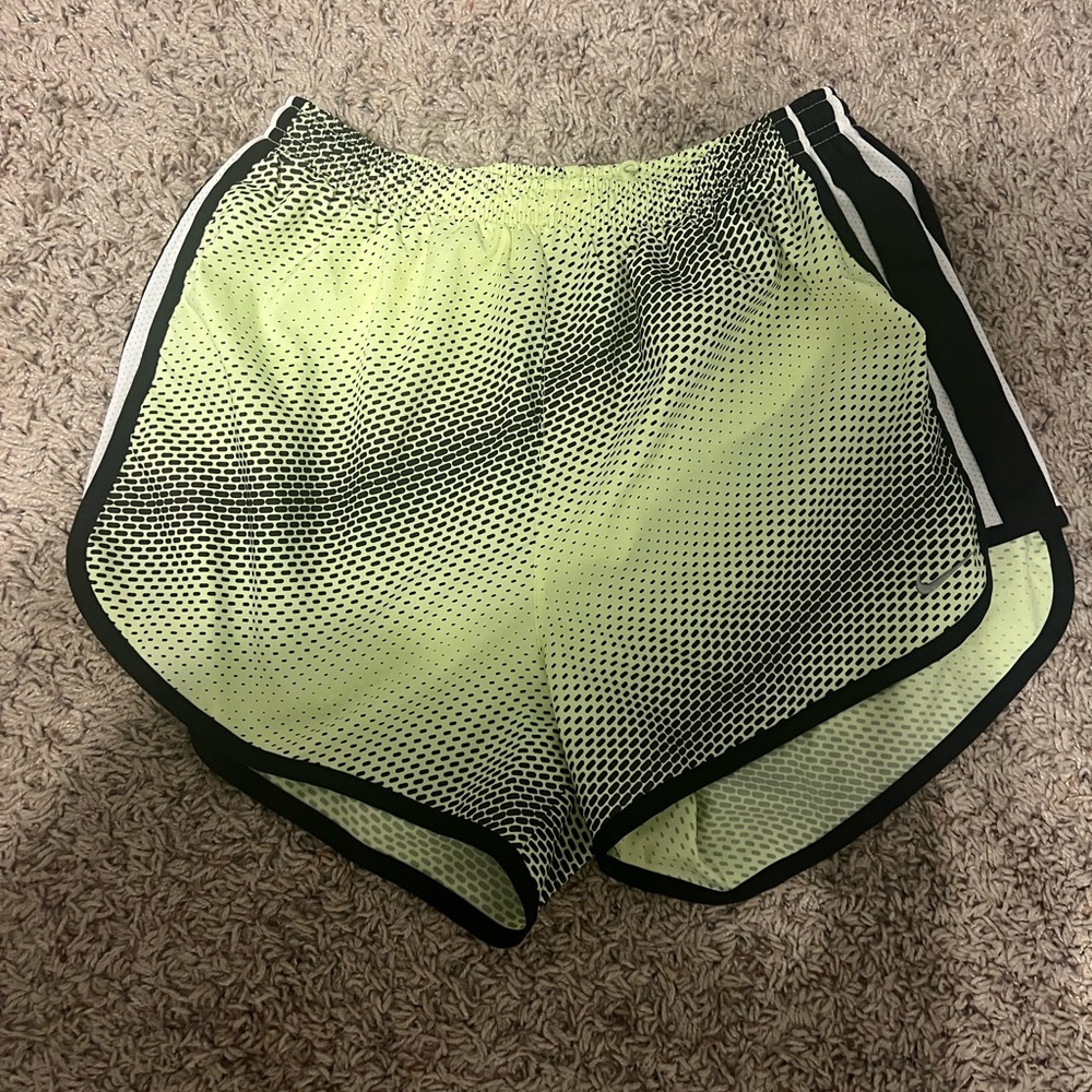 Green Nike running shorts. Size small.